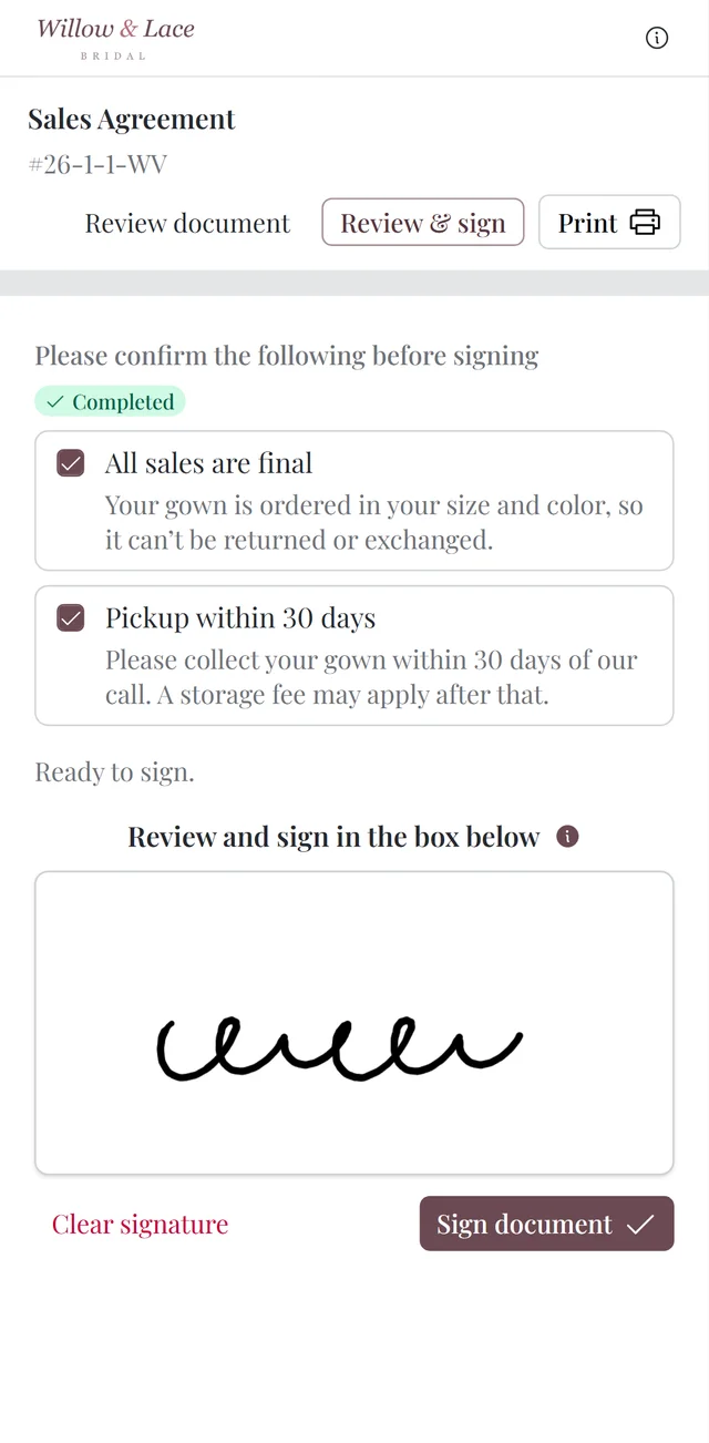 Signing a sales agreement on her phone: both required terms confirmed and her signature drawn
